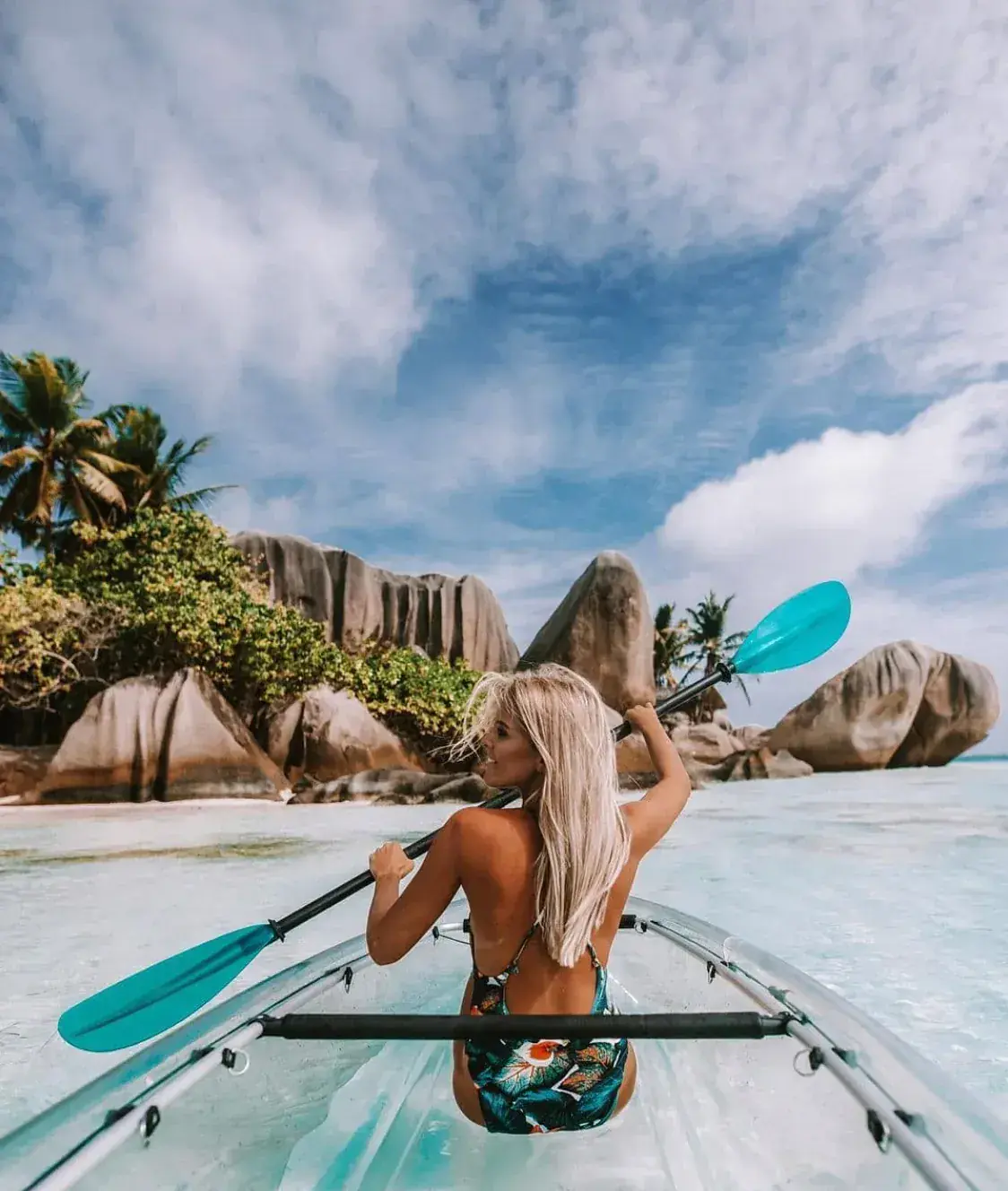 Guests exploring the La Digue lagoon